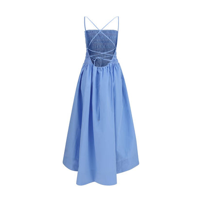 Dress by Ganni for women in cotton blue & signature features a dramatic silhouette, showcasing an elegant and that flows into a dramatic maxi long.