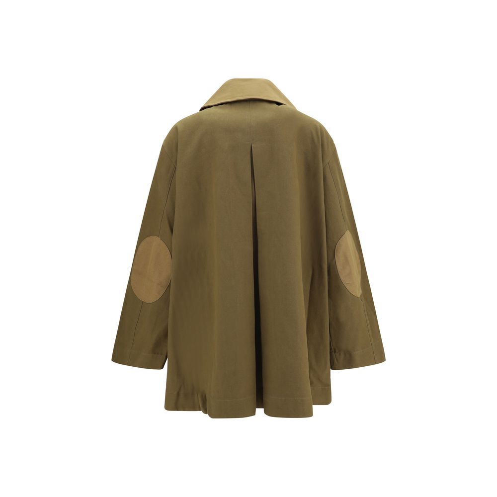 Overcoat by Ganni for women in organic cotton bicolour features an satoral silhouette, showcasing a sophisticated and satoral pockets for a premium, timeless look.