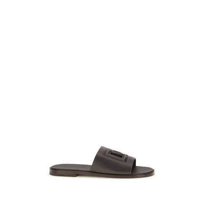 Flat Sandals by Dolce & Gabbana for men in bos taurus calf leather and brown presents a captivating silhouette, showcasing the signature style of the Men's Bos Taurus Calf Leather Flat Sandals with a captivating flat and captivating open toe style.