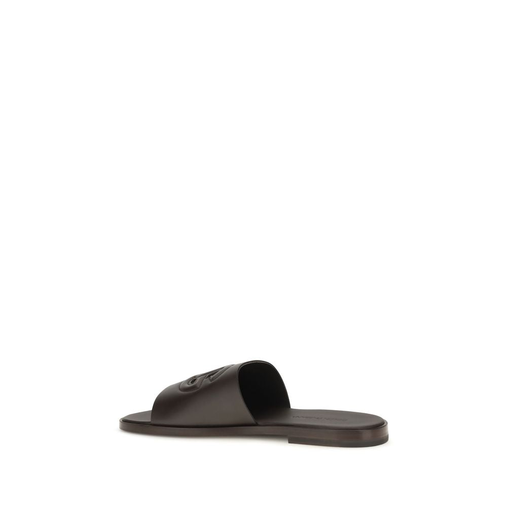 Flat Sandals by Dolce & Gabbana for men in bos taurus calf leather brown presents a sculptural silhouette, showcasing the Men's Bos Taurus Calf Leather Flat Sandals design with a sculptural flat and open toe style for a premium look.