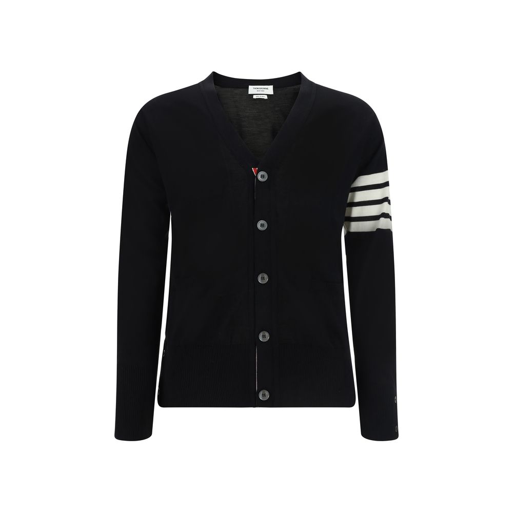 Cardigan by Thom Browne for men in virgin wool black, signature & striped presents a textural silhouette, artfully finished with a textural v-neck neckline and for a sophisticated, textural look.