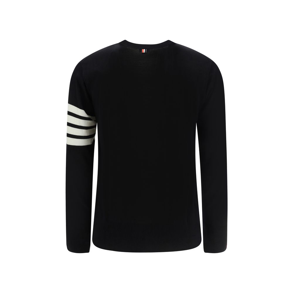 Cardigan by Thom Browne for men in virgin wool black, signature & striped features a nuanced silhouette with a refined v-neck neckline and nuanced detailing for a sophisticated look.