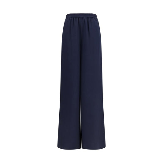 Trousers by Max Mara for women in silk blue presents a perennial silhouette, meticulously tailored with a regular-fit & wide cut, long finish, and an elegant .
