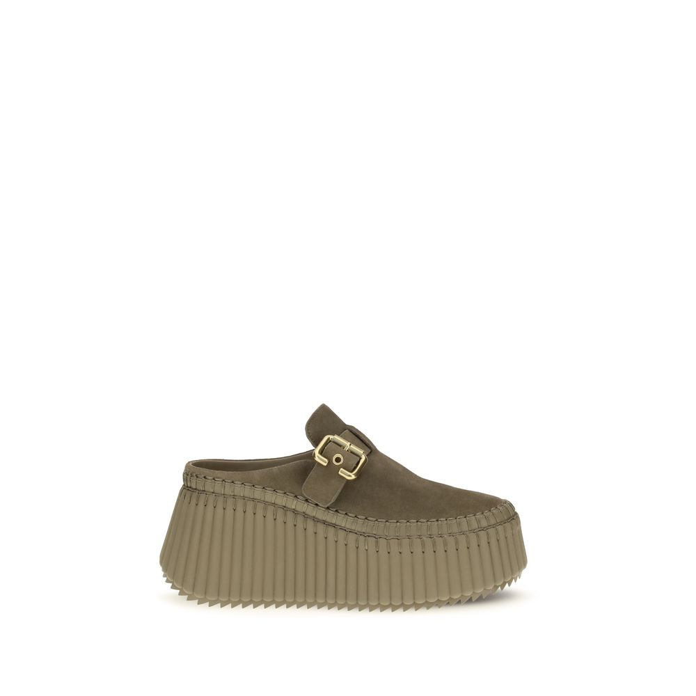 Mules Flat Shoes by Chloé for women in bos taurus calf suede leather bicolour showcases a dynamic silhouette, artfully capturing Paddington Women's Bos Taurus Calf Suede Leather Mules Flat Shoes through its distinctive and elegant .