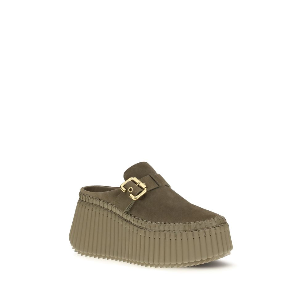 Mules Flat Shoes by Chloé for women in bos taurus calf suede leather bicolour features an captivating silhouette, showcasing the captivating style of the Paddington Women's Bos Taurus Calf Suede Leather Mules Flat Shoes with its distinct and refined .