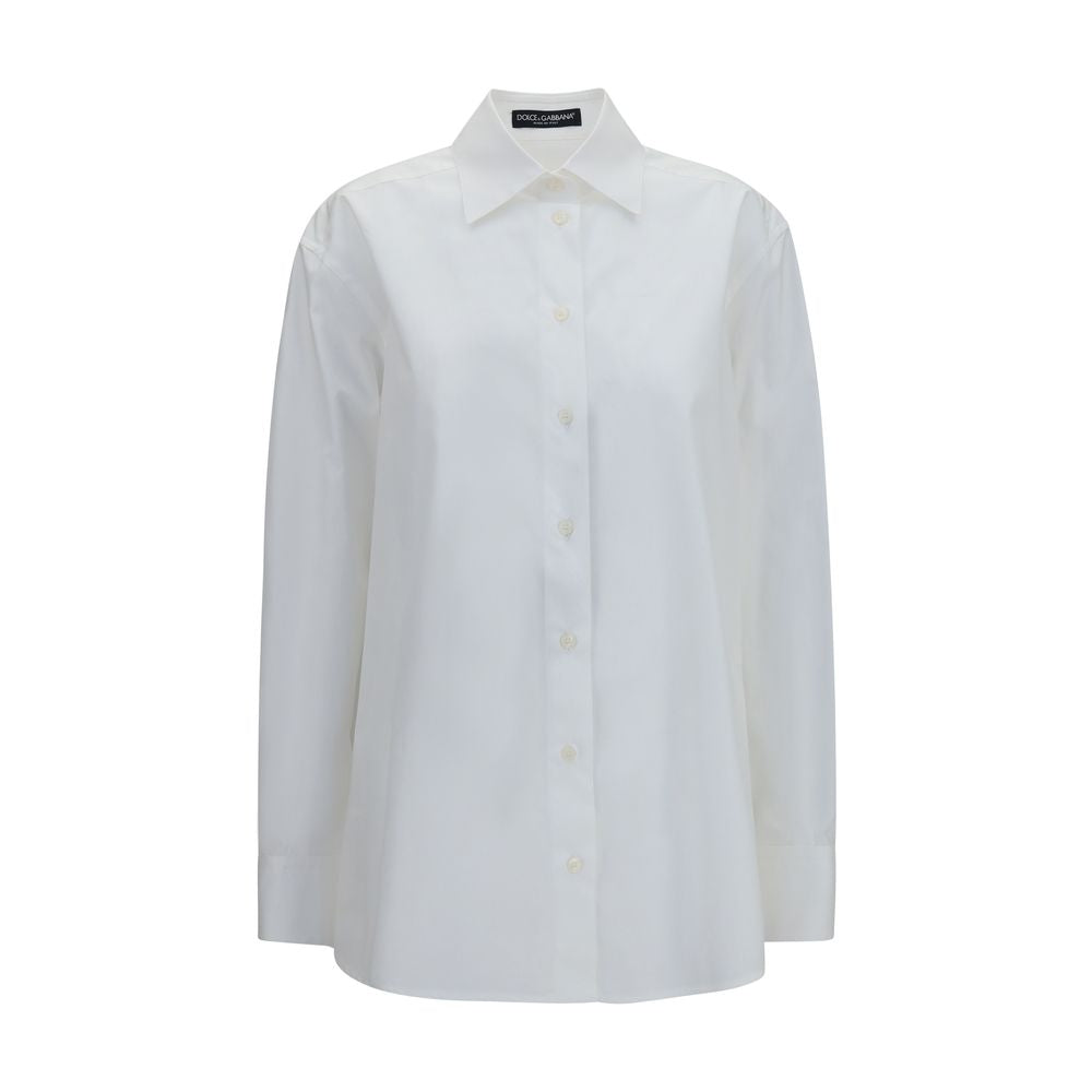 Dress Shirt by Dolce & Gabbana for women in cotton white showcases a sleek silhouette, elegantly detailed with a sleek and long-sleeve for a sleek finish.