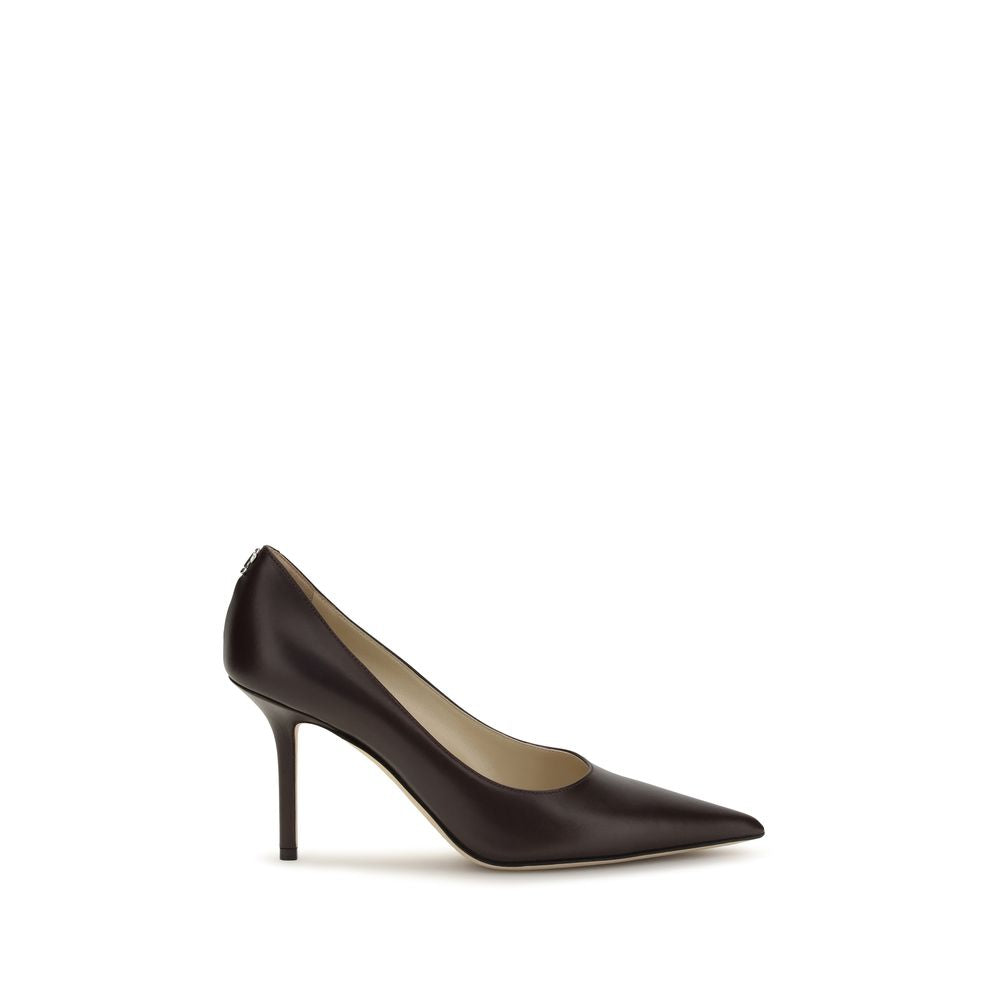 High-Heel Stiletto Pumps Heels by Jimmy Choo for women in bos taurus calf leather brown & signature features a effortless chic silhouette, showcasing the Women's Bos Taurus Calf Leather High-Heel Stiletto Pumps Heels design with a effortless chic stiletto high-heel and pointed toe style for a effortless chic finish.
