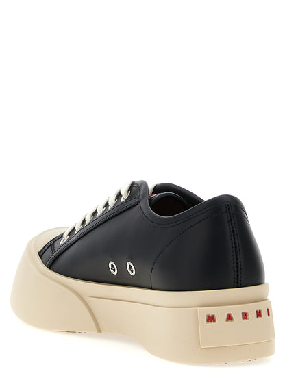 Sneakers by Marni for men in calfskin leather black presents a sumptuous silhouette, artfully capturing the essence of the City Men's Low Top Calfskin Leather Sneakers with its sumptuous low-top style design.
