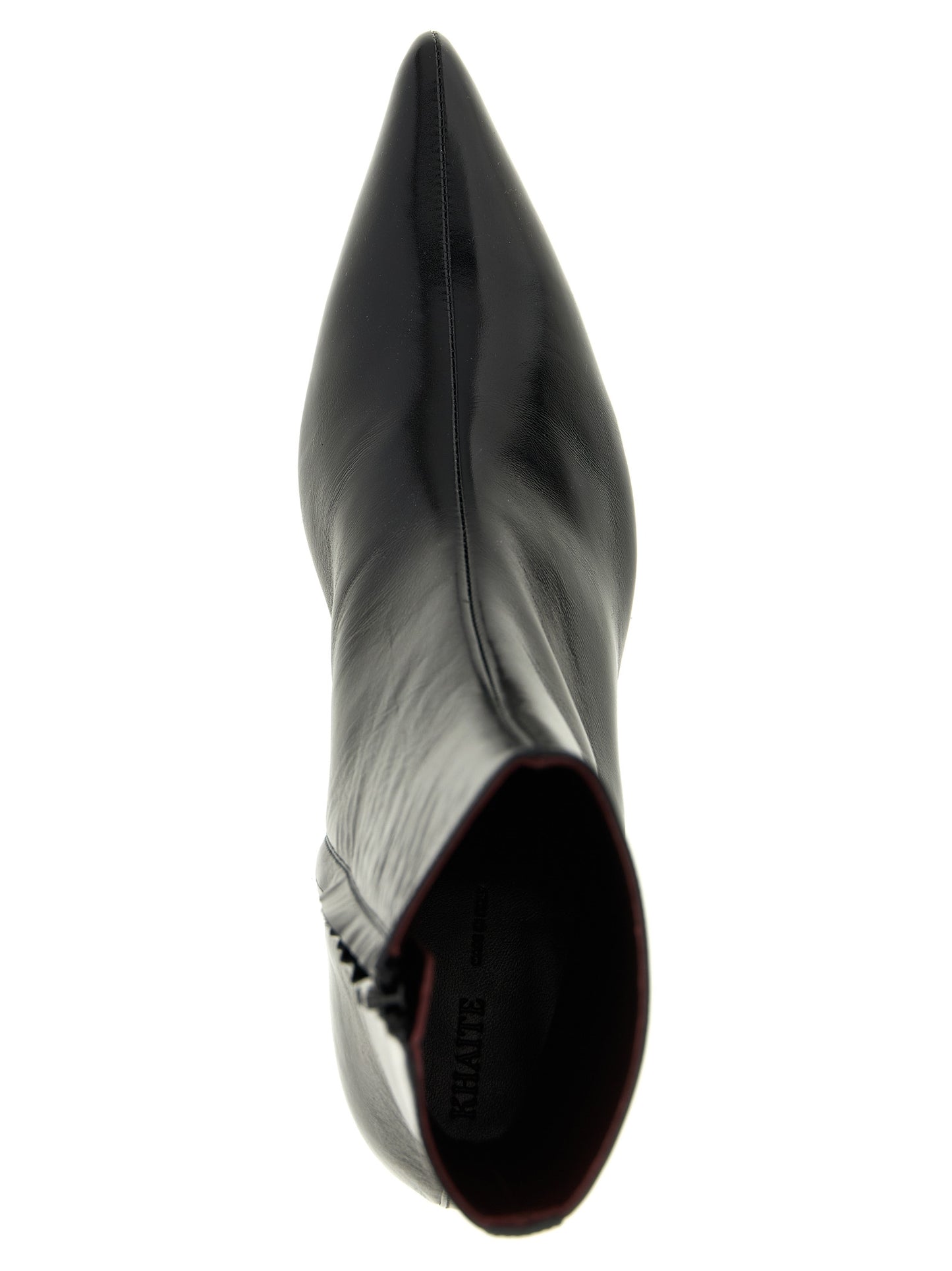 Wedge Ankle Boots by Khaite for women in calfskin leather black features an enchanting design from the Women's Calfskin Leather Wedge Ankle Boots collection, highlighting a enchanting wedge and pointed toe style for a refined look.