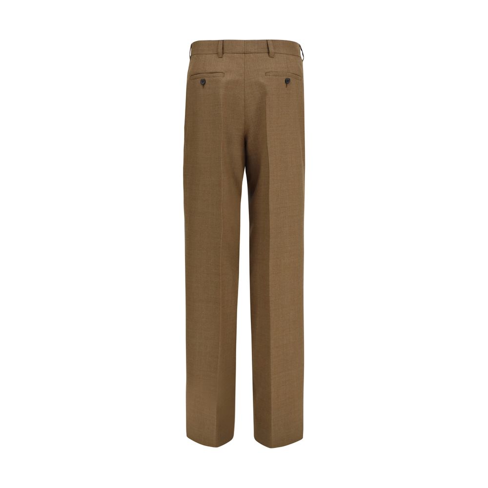 Trousers by Prada for women in merino wool brown features a sculptural silhouette, showcasing a sculptural straight, regular-fit & wide and long with a sophisticated for a sculptural finish.