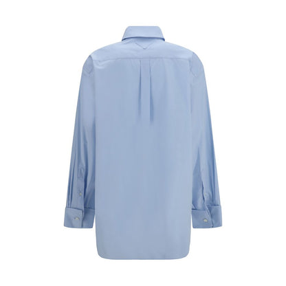 Shirt by Prada for women in cotton blue & pearl showcases a sublime silhouette, artfully detailed with a sublime and for a sophisticated, sublime finish.