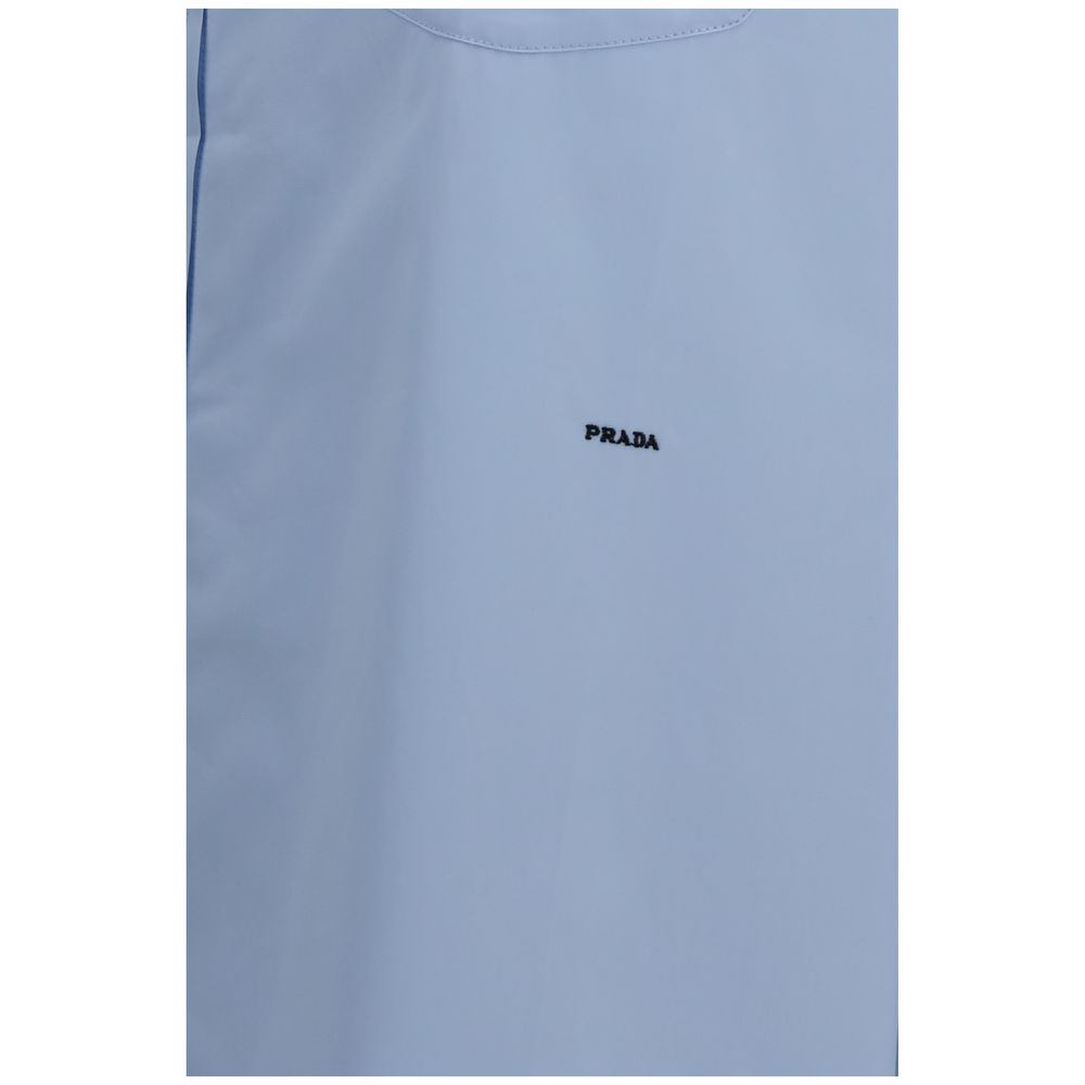 Shirt by Prada for women in cotton blue & pearl features an polished silhouette, showcasing a sophisticated and detail for a truly polished finish.