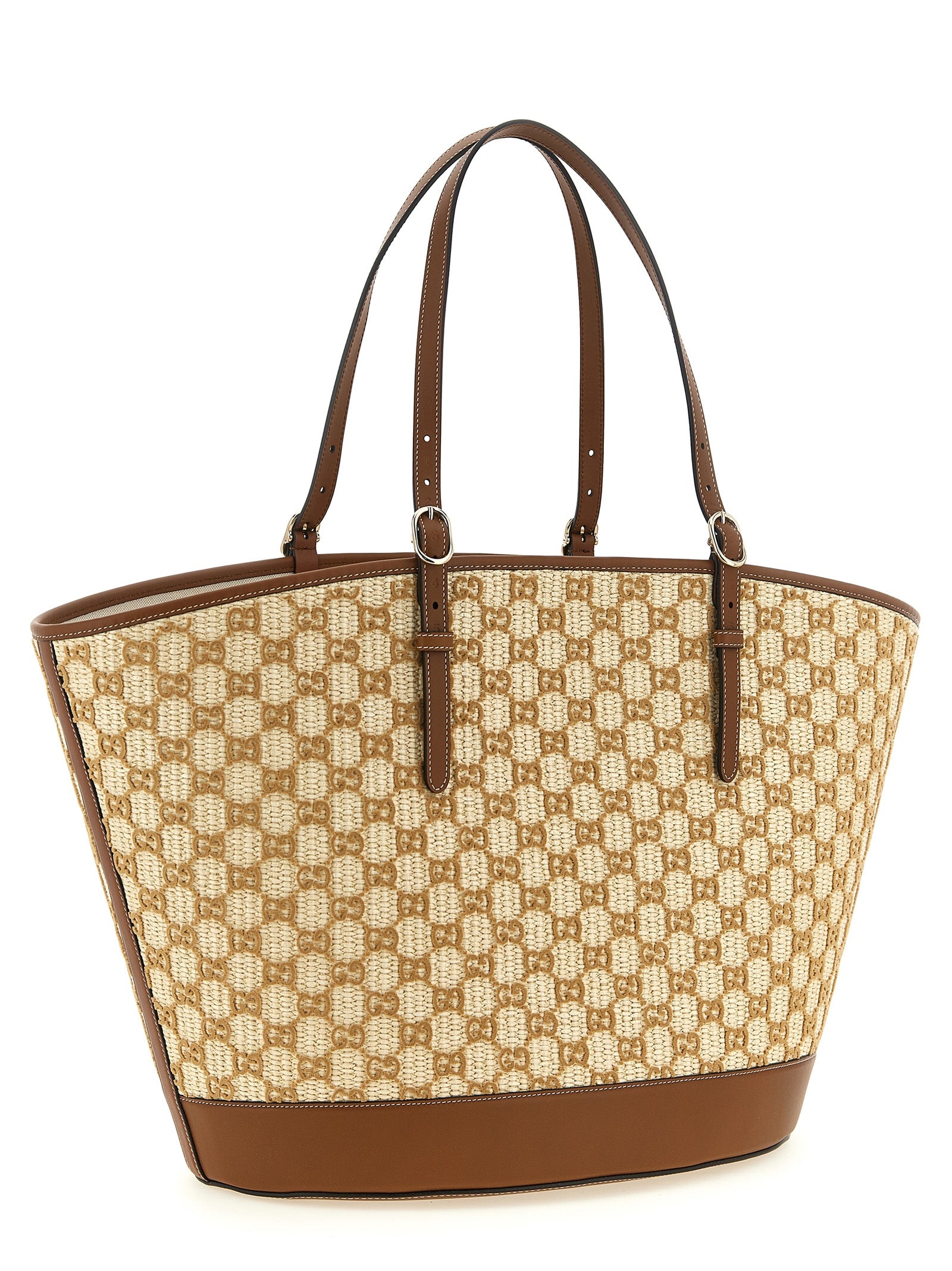 Shopper Handbag by Gucci for women in cotton & leather brown & patterned presents a ornamental silhouette, showcasing a secure zipper & magnetic, ample , and versatile adjustable-strap & handle for a ornamental finish.
