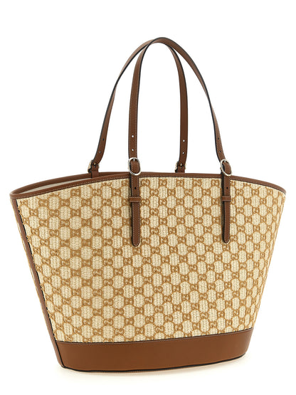 Shopper Handbag by Gucci for women in cotton & leather brown & patterned presents a ornamental silhouette, showcasing a secure zipper & magnetic, ample , and versatile adjustable-strap & handle for a ornamental finish.