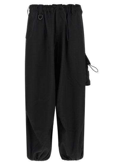 Cargo Pants by Y-3 for men in polyester black features an urban chic with a and long, creating a urban chic aesthetic for "Moon Behind the Hill".