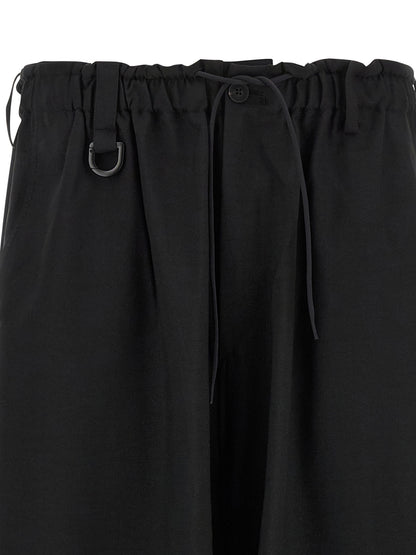 Cargo Pants by Y-3 for men in polyester black presents a on trend silhouette, artfully finished with a on trend , long, and for a sophisticated look.
