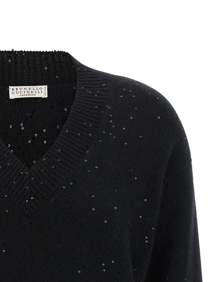 Cardigan by Brunello Cucinelli for women in silk cashmere & sequins black showcases a captivating silhouette, artfully detailed with a captivating and v-neck neckline for a truly sophisticated captivating look.