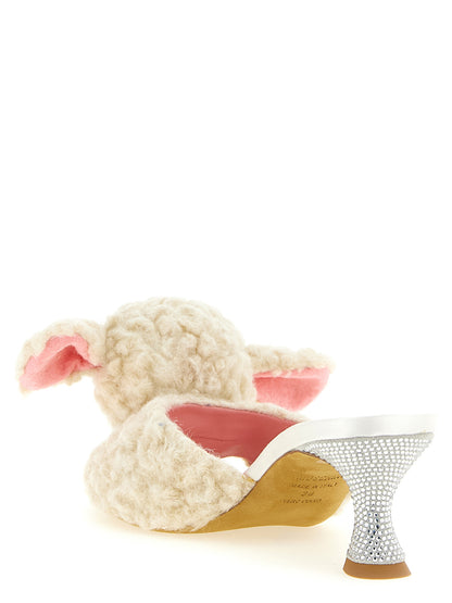 Mules Sandals Flat Shoes by Moschino for women in sheep leather & virgin wool cream, pink & white showcases a resplendent Women's Sheep Leather & Virgin Wool Mules Sandals Flat Shoes aesthetic with a and .