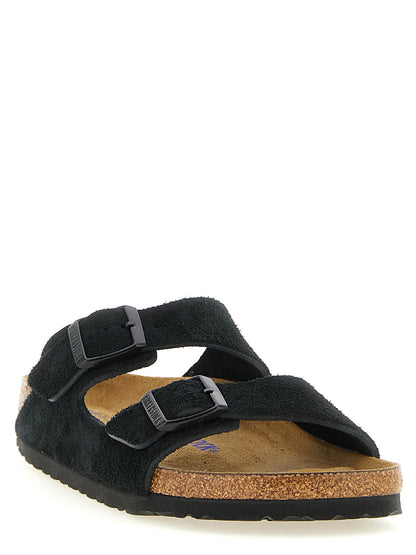 Flat Shoes by Birkenstock for men in eva & suede calfskin leather black showcases a timeless silhouette from the Men's EVA & Suede Calfskin Leather Flat Shoes collection, featuring a timeless flat and for a timeless finish.