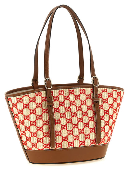 This Small Shopper Handbag by Gucci for women in stretch cotton modal canvas and multicolor, patterned & monogram presents a sculptural silhouette featuring a secure zipper, ample , and versatile adjustable-strap & handle for a sculptural finish.