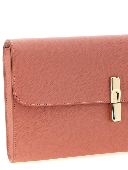 Clutch Handbag by Furla for women in calfskin leather coral, multicolor & pink features an sculptural silhouette, showcasing a secure and sculptural built-in-compartments & cardholder with versatile for a sophisticated look.