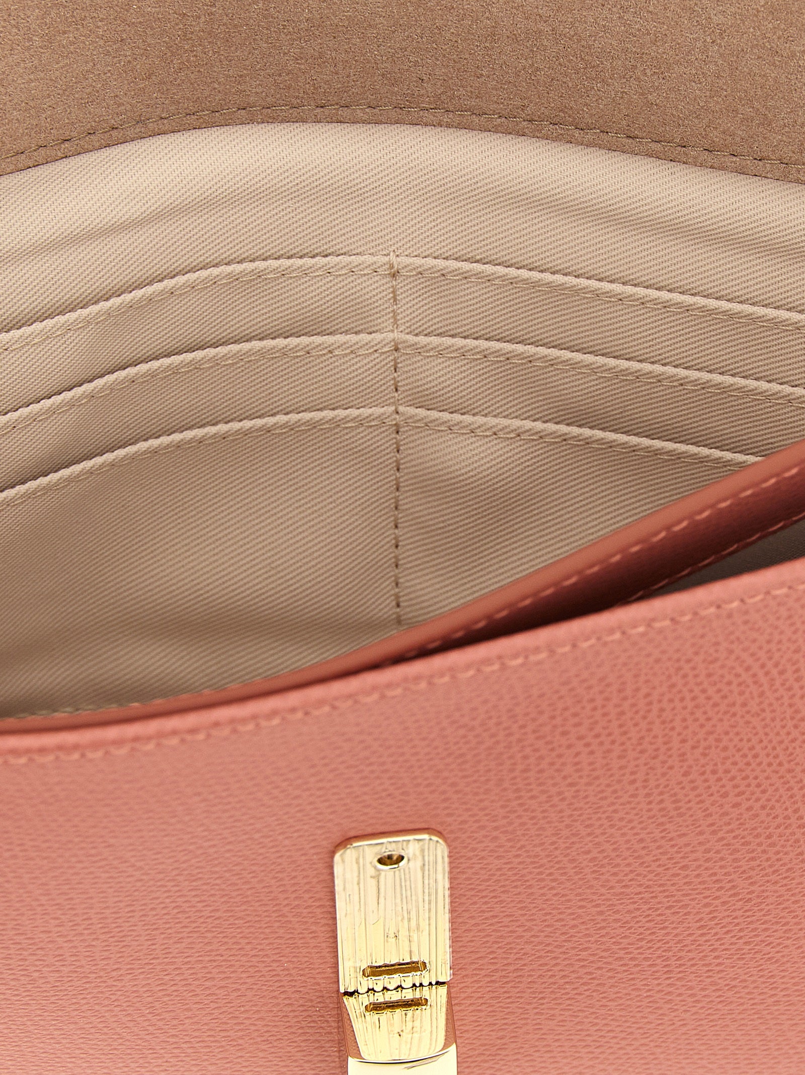 Clutch Handbag by Furla for women in calfskin leather coral, multicolor & pink showcases a sculptural silhouette, featuring a secure , ample built-in-compartments & cardholder, and versatile for a sculptural finish.