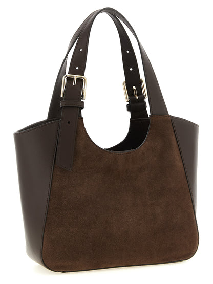 This Tote Hobo Handbag by Furla for women in calfskin leather and brown presents a sculptural silhouette featuring a secure buckle, ample , and versatile adjustable-strap & handle for a sculptural finish.