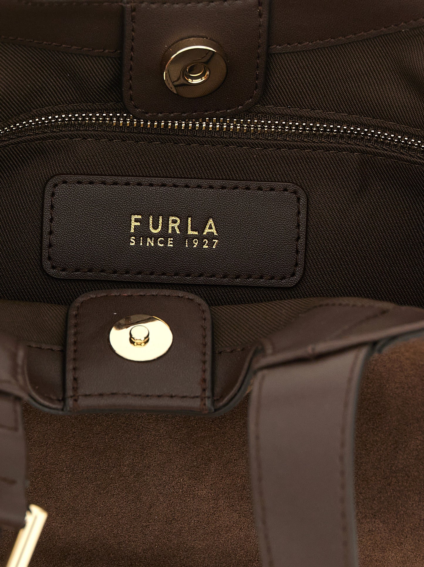 Tote Hobo Handbag by Furla for women in calfskin leather brown features a signature silhouette, showcasing a secure buckle and signature with versatile adjustable-strap & handle for a sophisticated look.