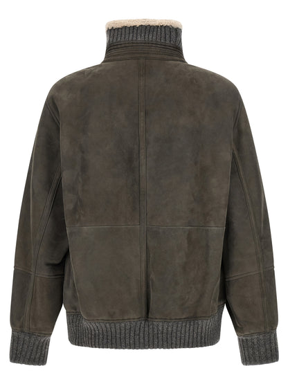 This Jacket by Brunello Cucinelli for men in lambskin leather gray & silver showcases a magnificent silhouette, meticulously crafted with a distinctive and functional for a magnificent finish.