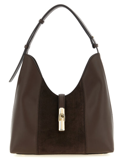 Shoulder Hobo Bag by Furla for women in calfskin leather brown features a statuesque silhouette, showcasing a secure zipper and statuesque with versatile shoulder-strap for a statuesque finish.