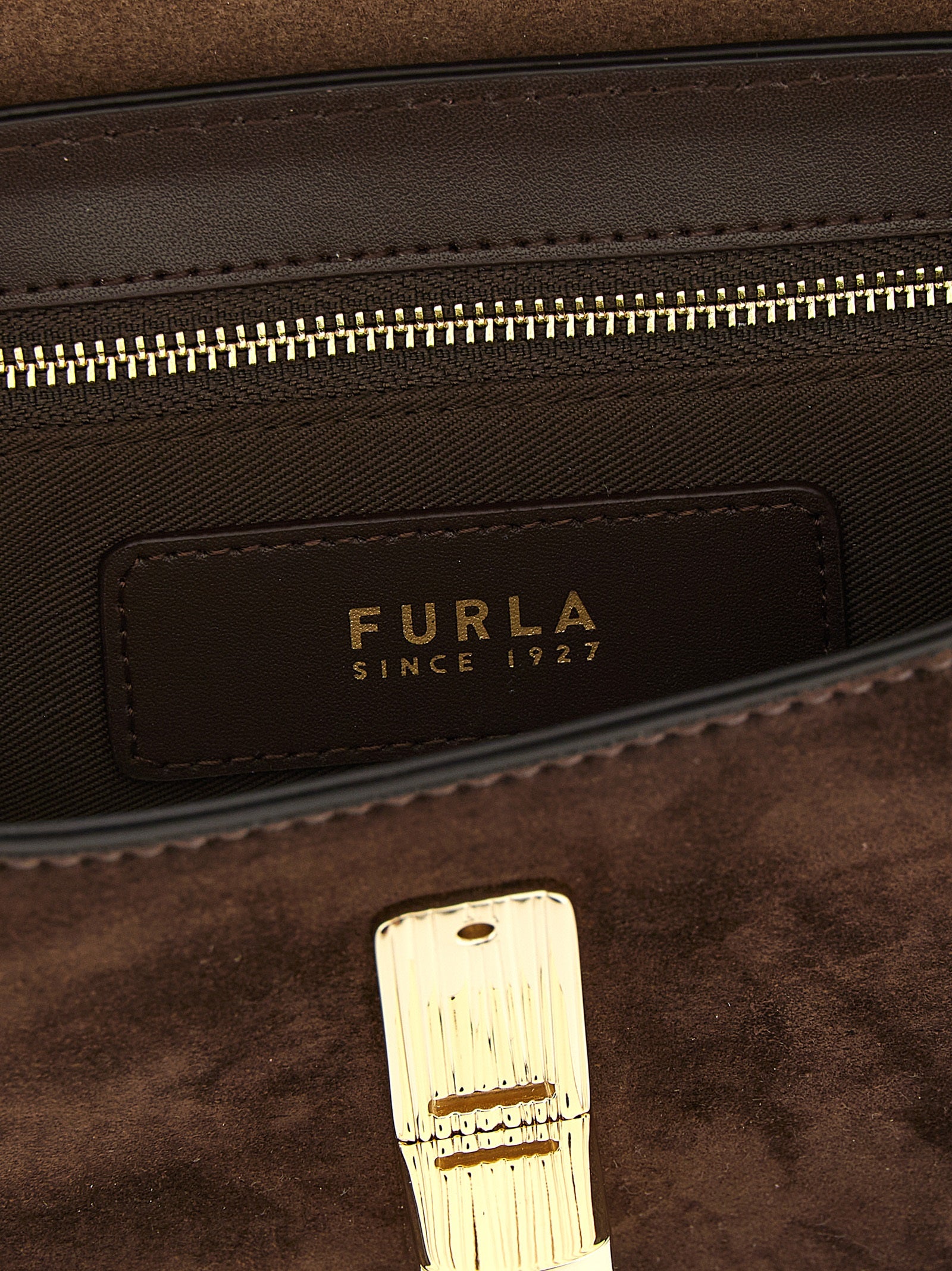 Crossbody Handbag by Furla for women in brass zamak & calf leather brown & gold features a transformative elegance silhouette, showcasing a secure magnetic, organized , and versatile crossbody-strap, shoulder-strap & adjustable-strap for a transformative elegance look.