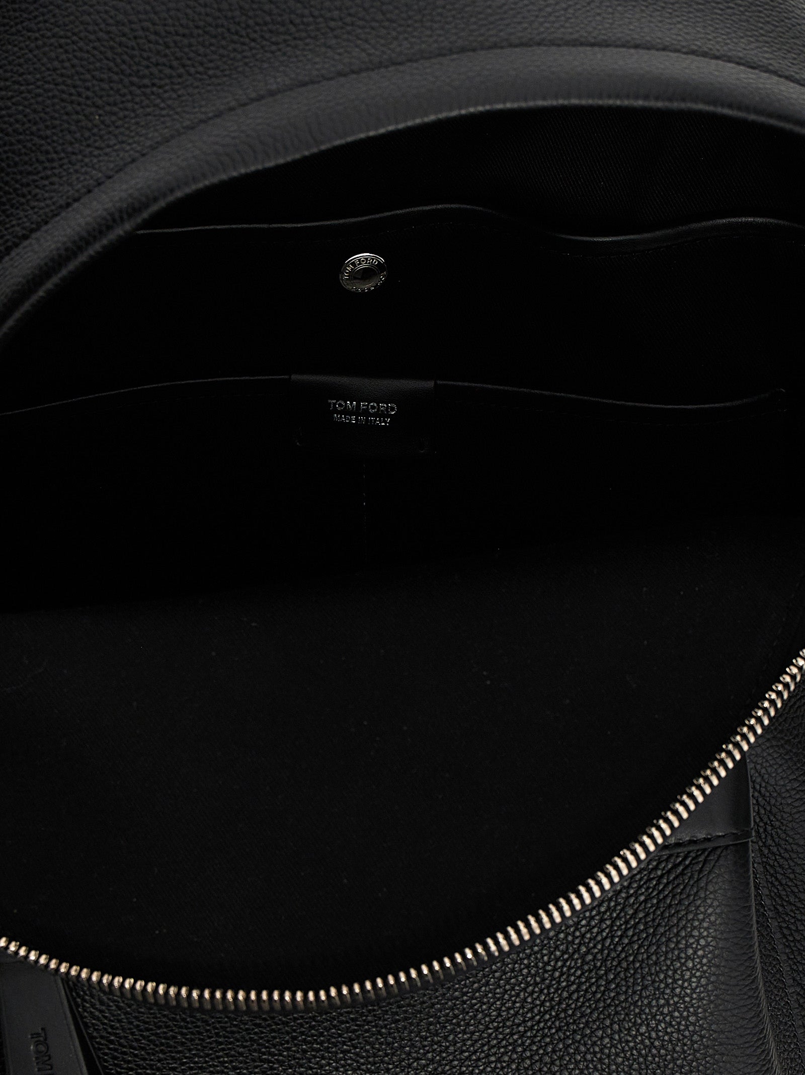 Backpack by Tom Ford for men in calfskin leather black features a refined silhouette, showcasing the Buckley Essence Calfskin Leather Backpack design with a secure zipper, ample , and versatile backpack-strap, adjustable-strap & handle.