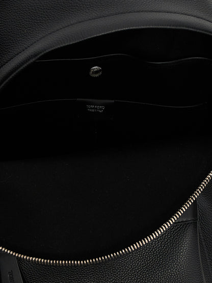 Backpack by Tom Ford for men in calfskin leather black features a refined silhouette, showcasing the Buckley Essence Calfskin Leather Backpack design with a secure zipper, ample , and versatile backpack-strap, adjustable-strap & handle.