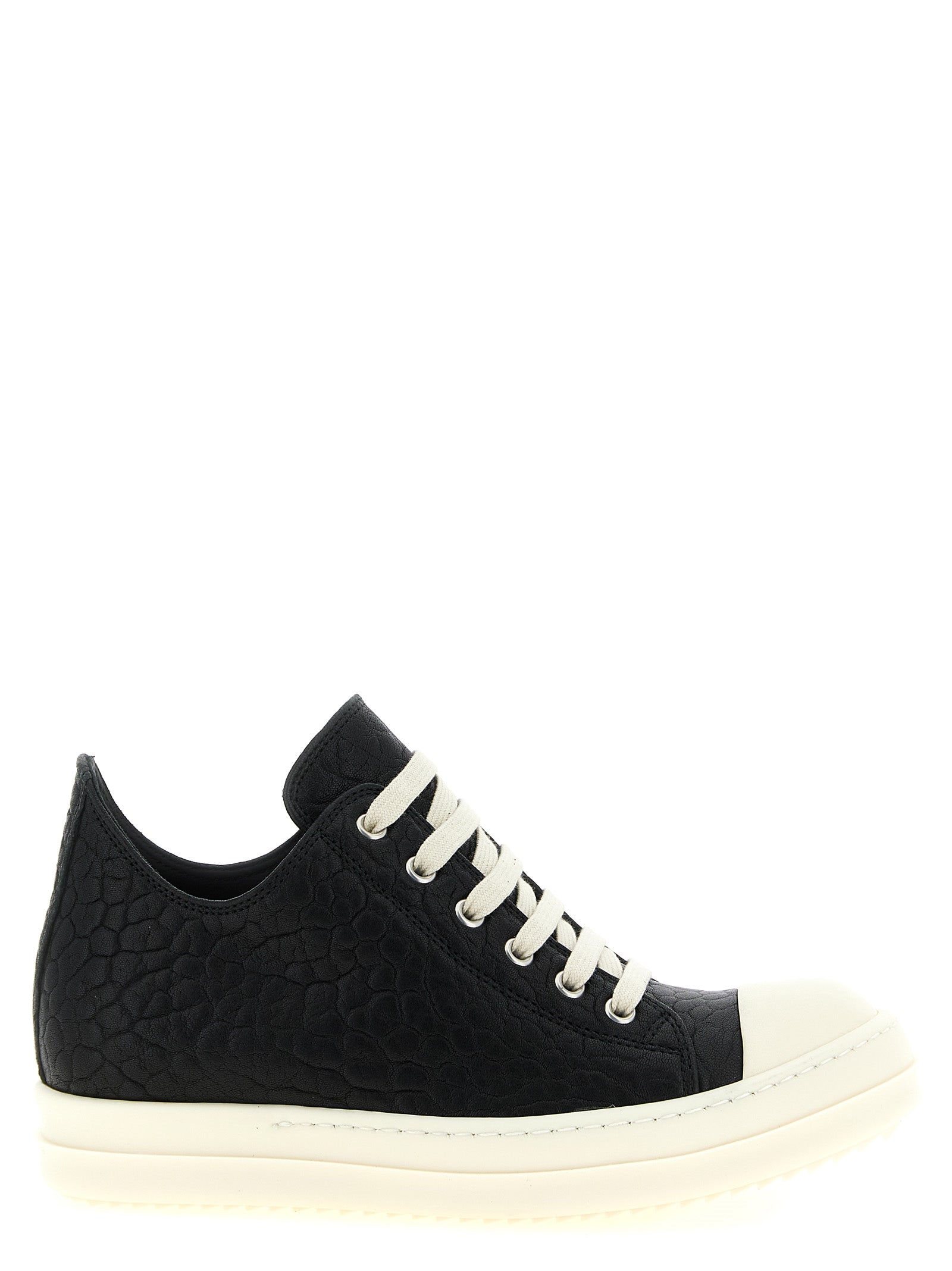 Sneakers by Rick Owens for women in lamb python leather bicolour, black & white presents a sumptuous silhouette, artfully capturing the essence of the Women's Low Top Lamb Python Leather Sneakers with its sumptuous low-top style design.