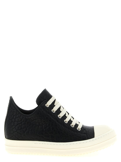 Sneakers by Rick Owens for women in lamb python leather bicolour, black & white presents a sumptuous silhouette, artfully capturing the essence of the Women's Low Top Lamb Python Leather Sneakers with its sumptuous low-top style design.