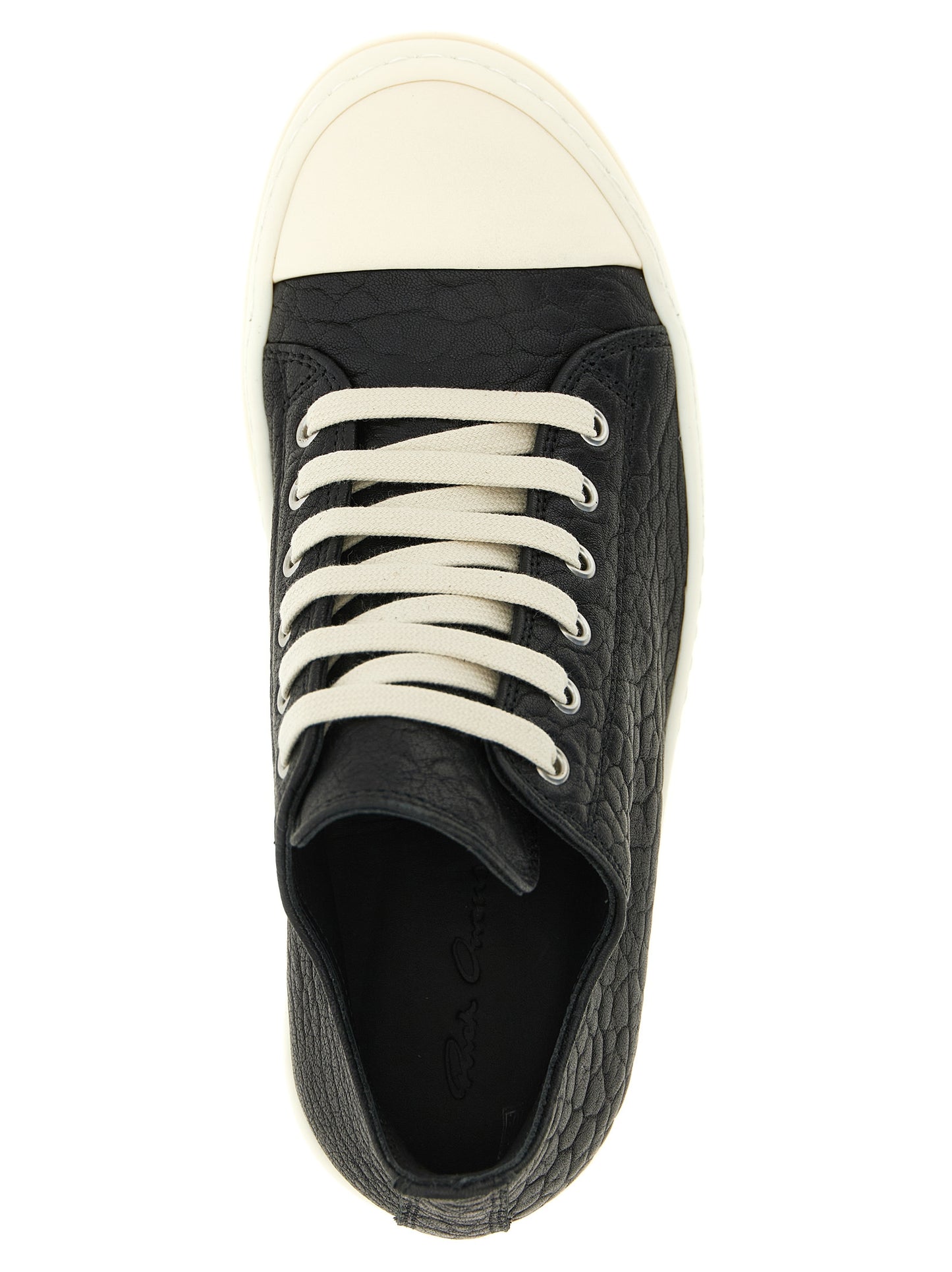 Sneakers by Rick Owens for women in lamb python leather bicolour, black & white features a chic design, perfectly showcasing the chic low-top style of this Women's Low Top Lamb Python Leather Sneakers.