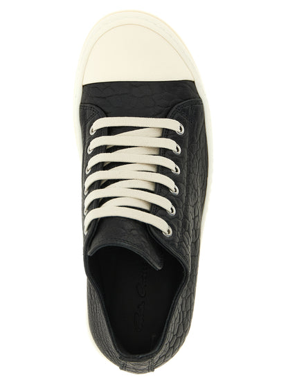 Sneakers by Rick Owens for women in lamb python leather bicolour, black & white features a chic design, perfectly showcasing the chic low-top style of this Women's Low Top Lamb Python Leather Sneakers.