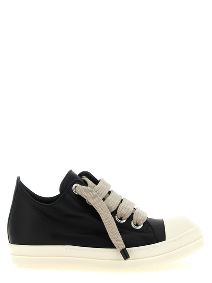 Sneakers by Rick Owens for women in bos taurus calfskin leather bicolour, black & white presents a impeccable silhouette as Women's Low Top Bos Taurus Calfskin Leather Sneakers, expertly defined by a impeccable low-top style for a impeccable, high-fashion look.