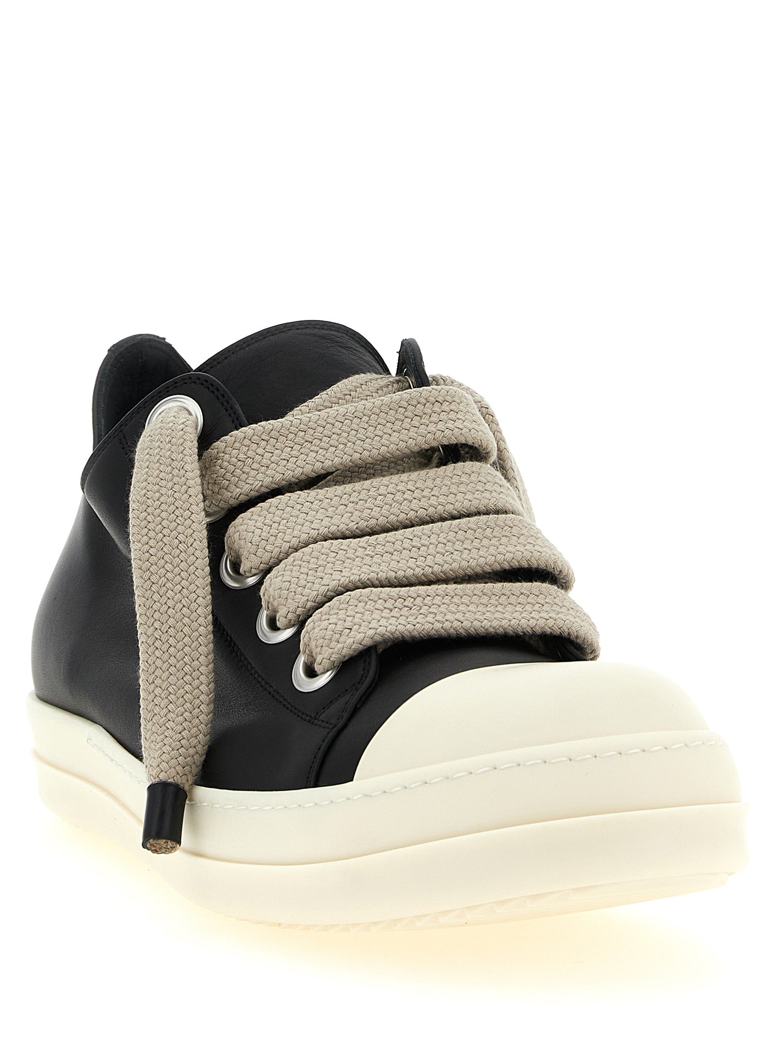Sneakers by Rick Owens for women in bos taurus calfskin leather bicolour, black & white presents a on trend silhouette from the Women's Low Top Bos Taurus Calfskin Leather Sneakers collection, showcasing a on trend low-top style for an elevated aesthetic.