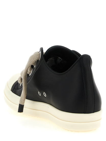 Sneakers by Rick Owens for women in bos taurus calfskin leather bicolour, black & white features an versatile design from the Women's Low Top Bos Taurus Calfskin Leather Sneakers collection, highlighting a versatile low-top style for a premium, high-fashion look.