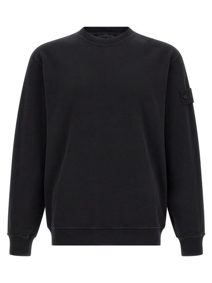 Sweatshirt by Stone Island for men in stretch organic cotton black features an enviable silhouette, showcasing a premium and refined crew neckline for a truly enviable finish.