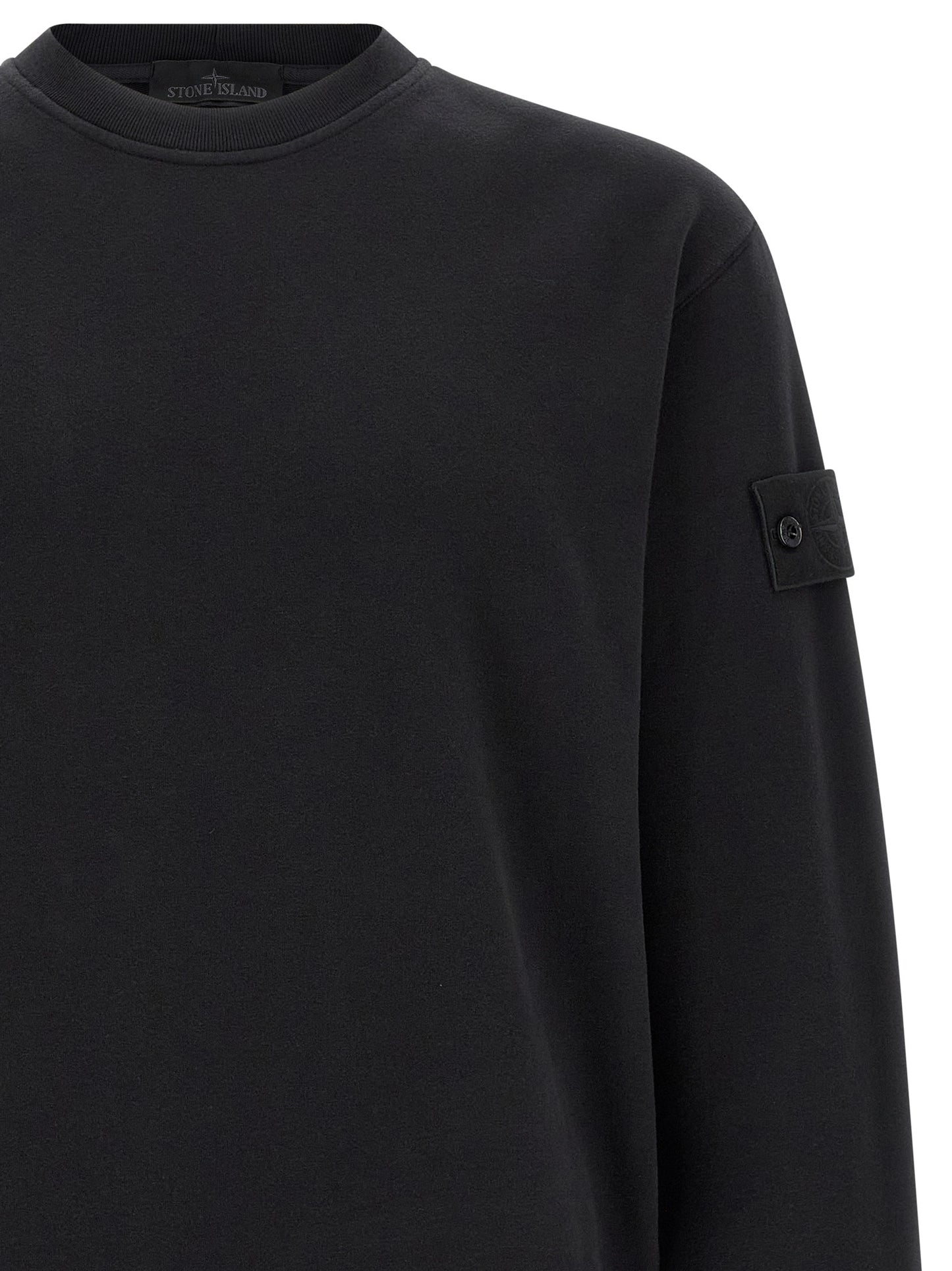 Sweatshirt by Stone Island for men in stretch organic cotton black features an exquisite silhouette, showcasing and crew neckline details for a exquisite look.