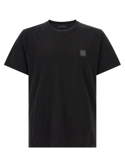 T-Shirt by Stone Island for men in organic cotton black showcases a dramatic silhouette, elegantly detailed with a dramatic crew neckline and short-sleeve for a truly dramatic finish.