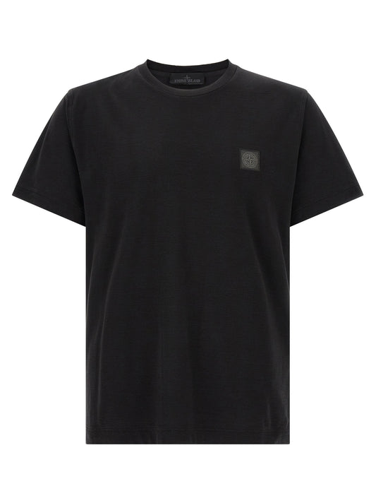 T-Shirt by Stone Island for men in organic cotton black showcases a dramatic silhouette, elegantly detailed with a dramatic crew neckline and short-sleeve for a truly dramatic finish.