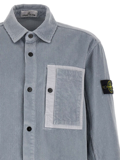 Overshirt by Stone Island for men in cotton corduroy gray & signature showcases a sleek silhouette, elegantly detailed with a sleek and for a sleek finish.