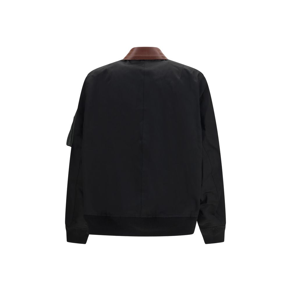Bomber Jacket by Sacai for men in leather & cotton black showcases a bohemian silhouette, artfully detailed with a bohemian and signature pockets for a truly bohemian finish.