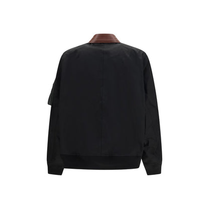 Bomber Jacket by Sacai for men in leather & cotton black showcases a bohemian silhouette, artfully detailed with a bohemian and signature pockets for a truly bohemian finish.