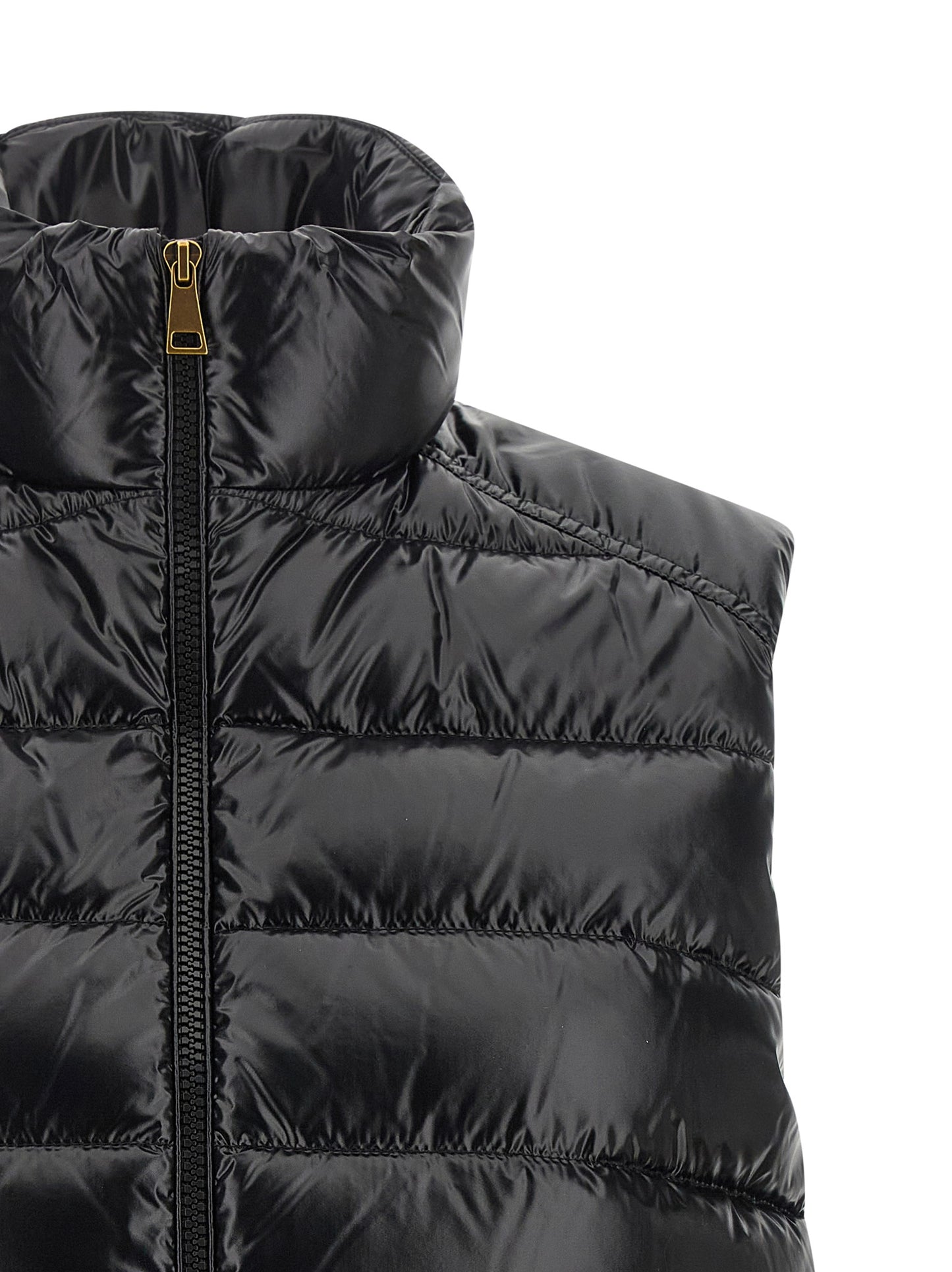 Vest by Moncler for women in polyamide black features a stylish silhouette, showcasing distinct pockets and a refined high-neck neckline for a truly stylish finish.