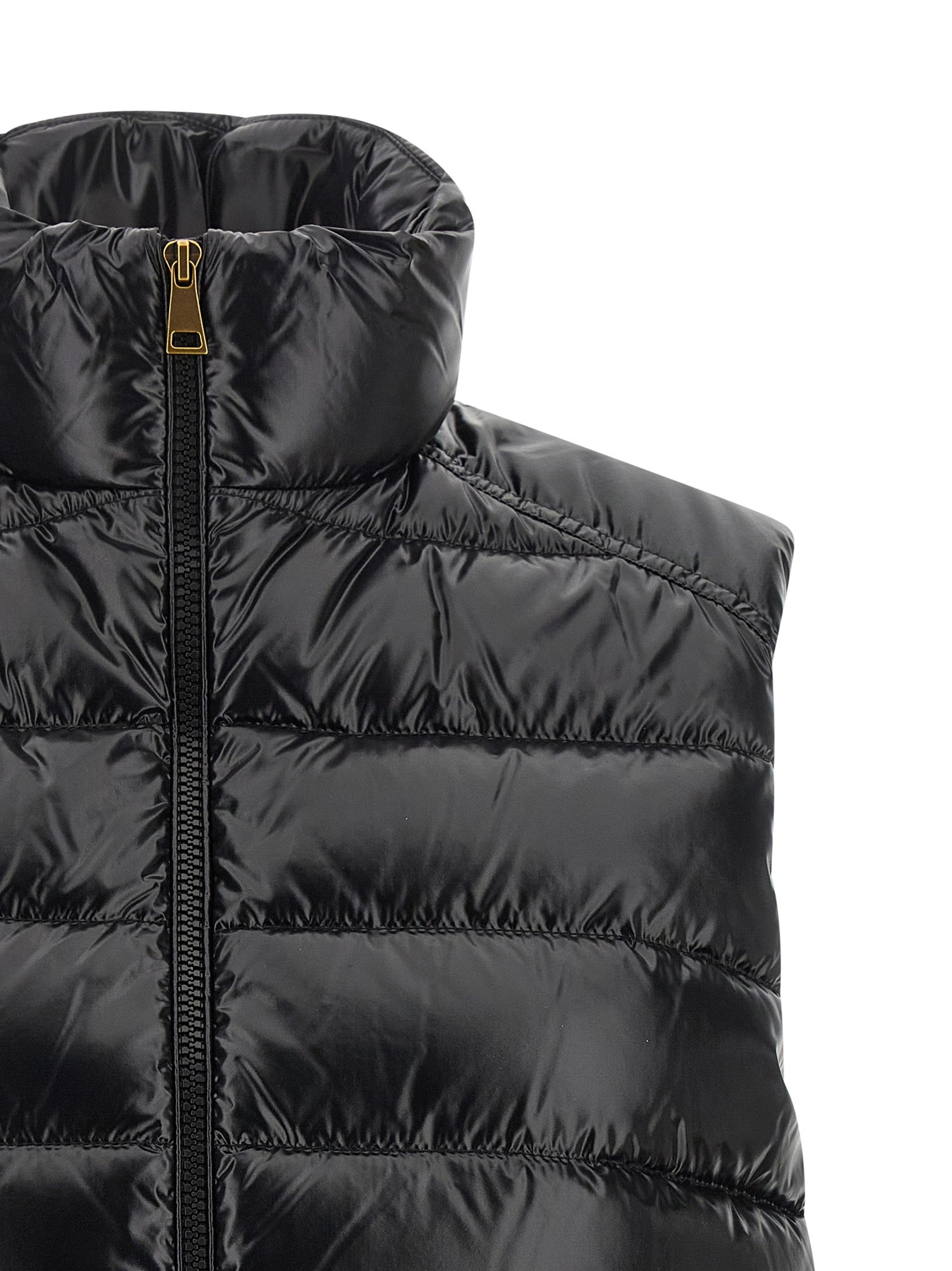 Vest by Moncler for women in polyamide black features a stylish silhouette, showcasing distinct pockets and a refined high-neck neckline for a truly stylish finish.
