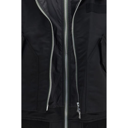 Bomber Jacket by Sacai for men in cotton nylon twill black features a dramatic silhouette, showcasing a sophisticated and distinctive pockets for a dramatic aesthetic.